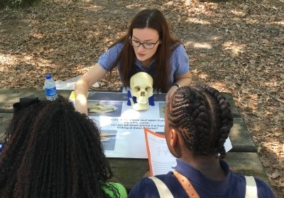 Student working with CSI participants